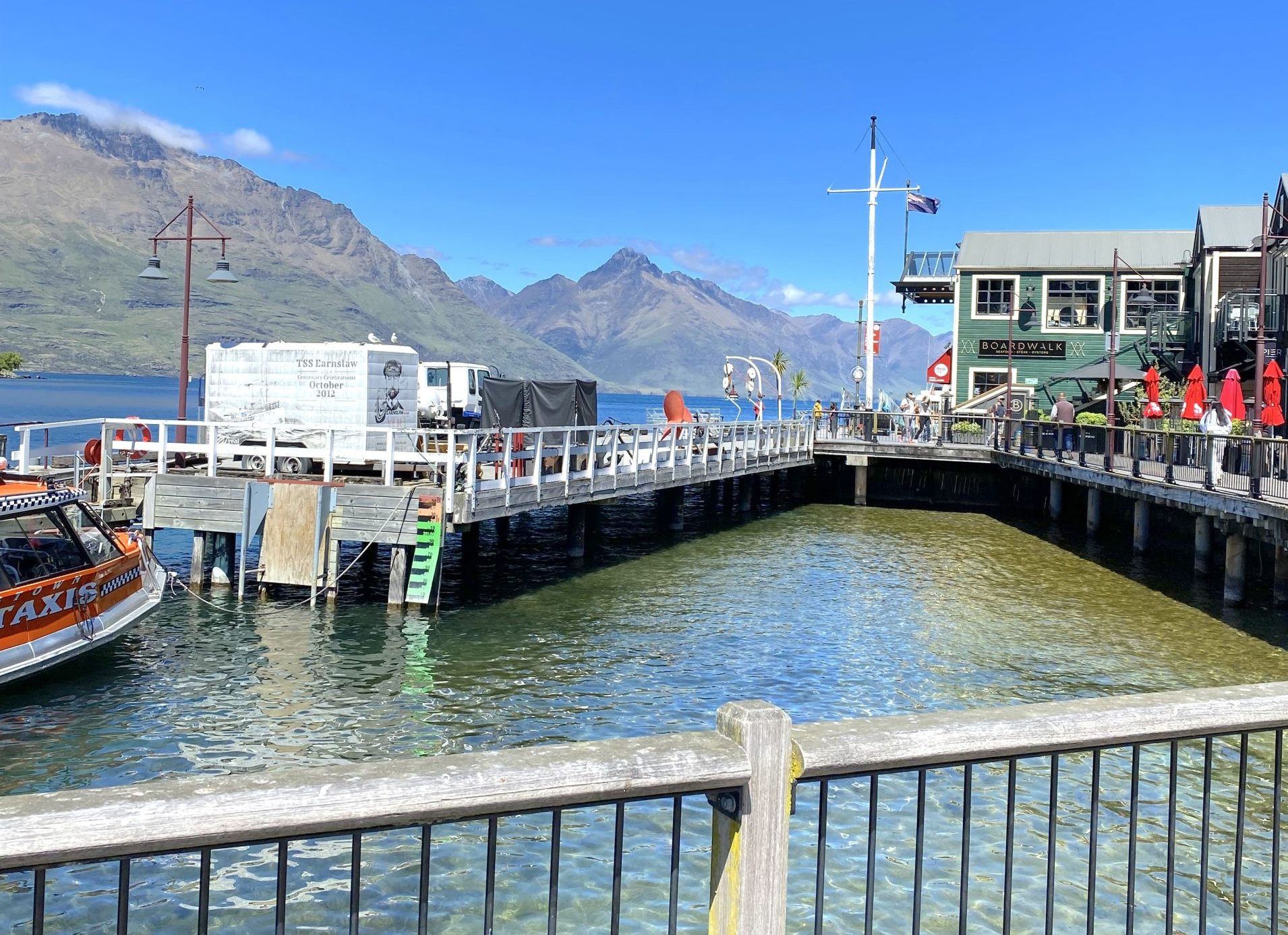 Queenstown lake with boat jetty Queenstown lake with boat jetty